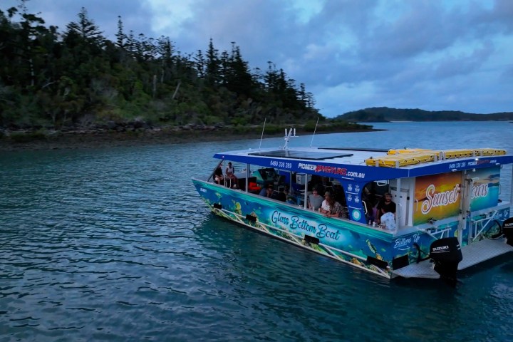 a small boat in a body of water