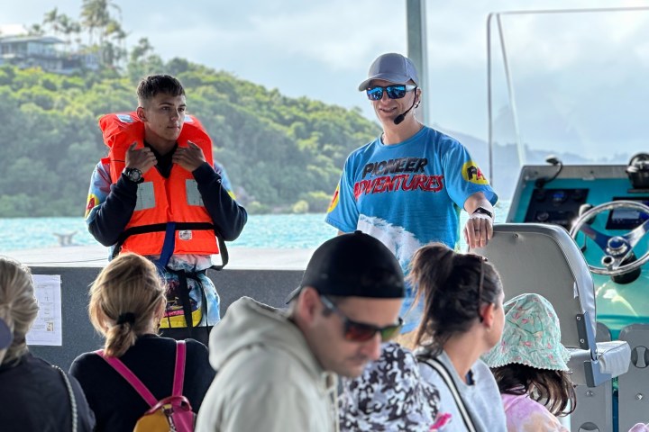 a group of people looking at the camera