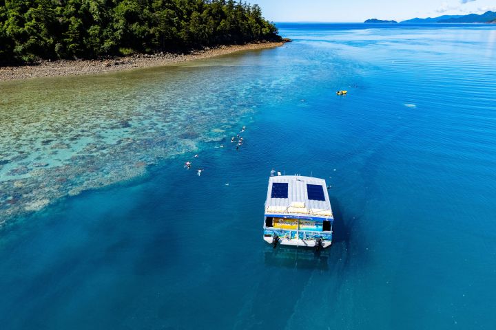 a pool next to a body of water