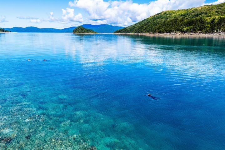 a small boat in a body of water