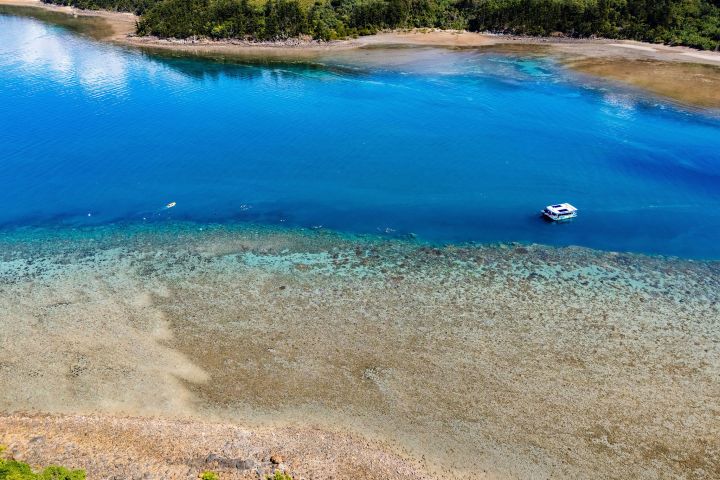 a pool next to a body of water