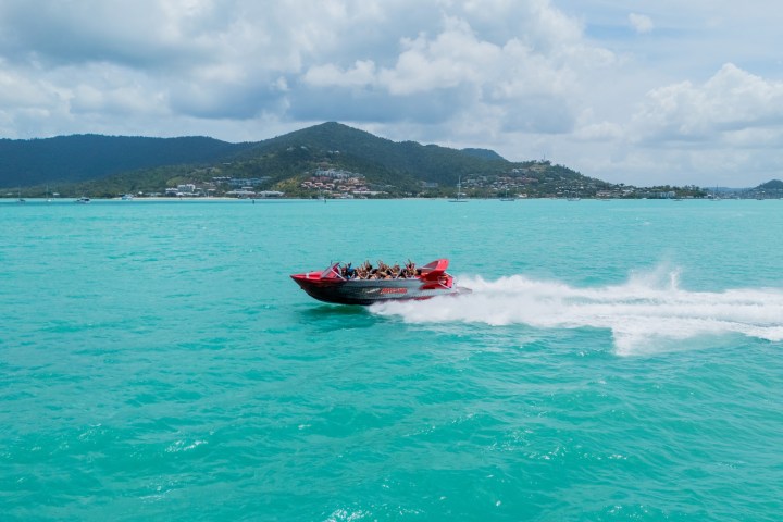 a small boat in a body of water